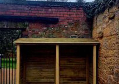 Dans Good Wood Store Log Store installed in a customers garden.