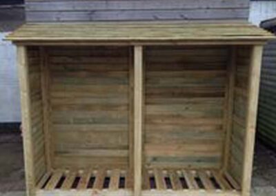 Dans Good Wood Store Log Store installed in a customers garden.