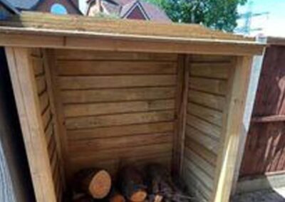 Dans Good Wood Store Log Store installed in a customers garden.