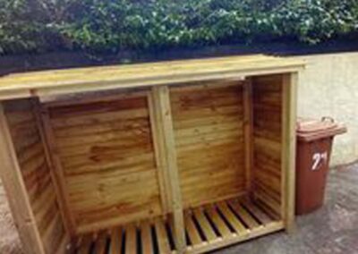 Dans Good Wood Store Log Store installed in a customers garden.
